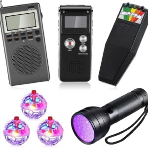 Ghost hunting kit laid out: EMF detector, digital EVP recorder, spirit box radio, UV flashlight, and three LED orb lights.