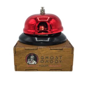 Red call bell on wooden box with Ghost Daddy logo - haunted-themed EMF detector for ghost hunting.