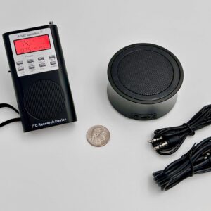 Portable P-SB7 Spirit Box and DAS-X1 speaker with cables and a quarter for size comparison on a white background.