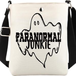 White crossbody bag featuring black ghost graphic and Paranormal Junkie text, perfect for ghost hunting enthusiasts.