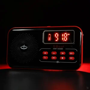 Compact digital radio with red LED display and control buttons on a black background