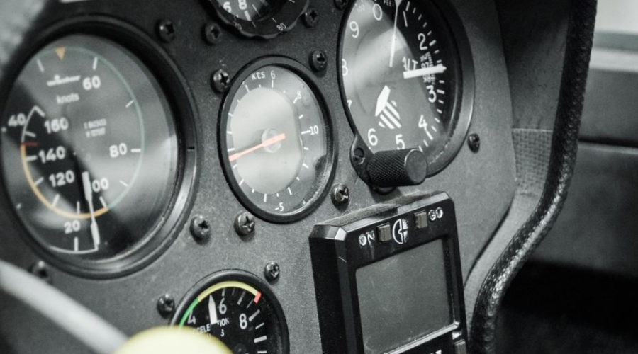 Close-up of vintage aircraft cockpit gauges and instruments