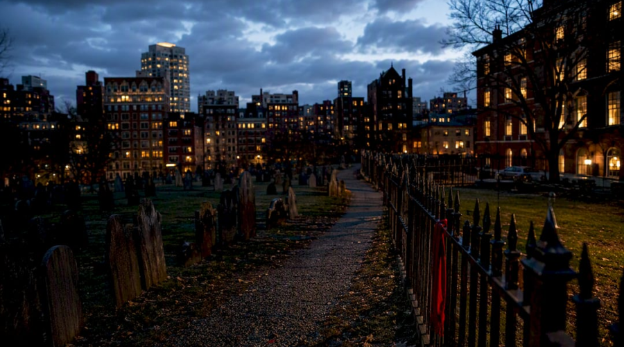 Historic cemetery among haunted places in Boston at dusk