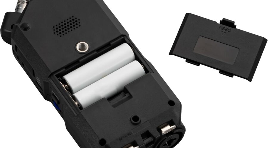 Zoom H4 Essential handheld recorder with open battery compartment and removable cover