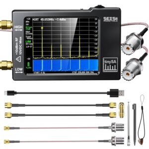 Portable TinySA spectrum analyzer with touchscreen, antenna cables, and RF adapters for signal testing