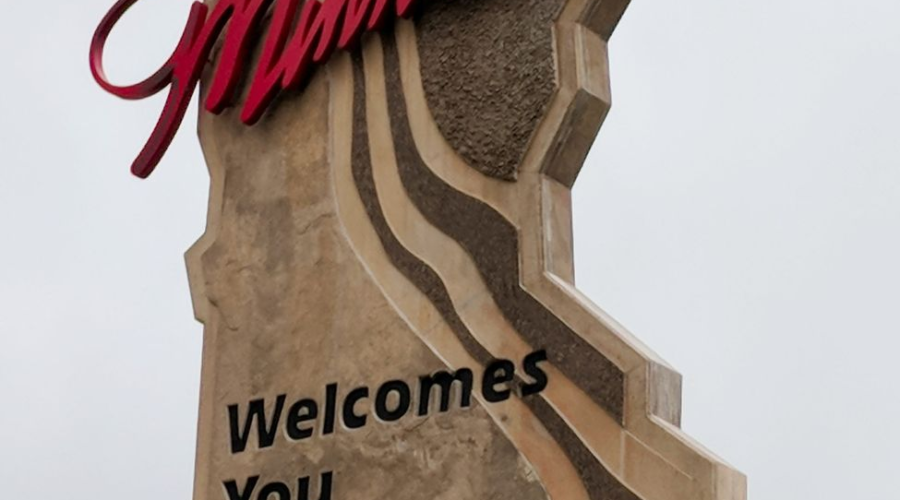 Minnesota-shaped welcome sign reading “Minnesota Welcomes You”