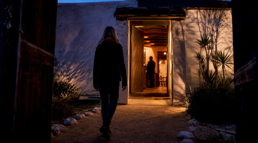 Investigator entering historic haunted site