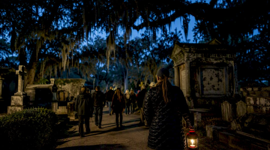 Lantern tour through moss-draped historic cemetery