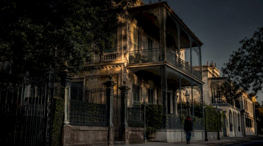 Historic New Orleans mansion viewed from sidewalk